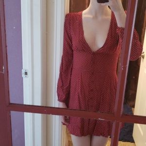 Tight sext red and white dotted Windsor dress.